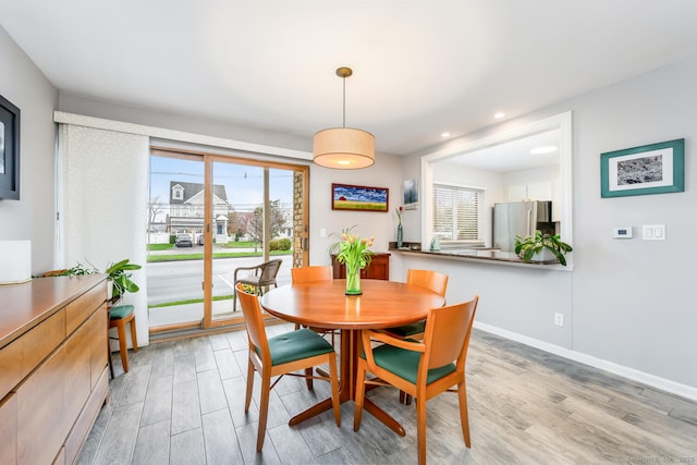 199 Gregory Blvd Apt F1, Norwalk, CT 06855 - dining space with light wood finished floors, plenty of natural light, recessed lighting, and baseboards