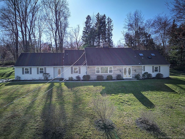 10 Edgehill Dr, Woodbridge, CT 06525 - view of front facade with a front lawn and a chimney