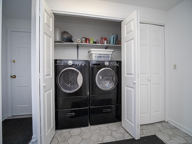 10 Edgehill Dr, Woodbridge, CT 06525 - washroom with washing machine and clothes dryer and light tile patterned flooring