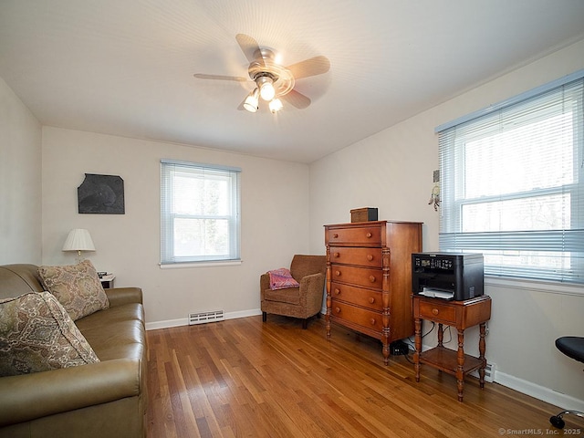 10 Edgehill Dr, Woodbridge, CT 06525 - living area featuring wood finished floors, baseboards, and a ceiling fan