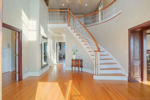 7 Long Meadow Ln, Redding, CT 06896 - entrance foyer with a high ceiling, a notable chandelier, and stairway