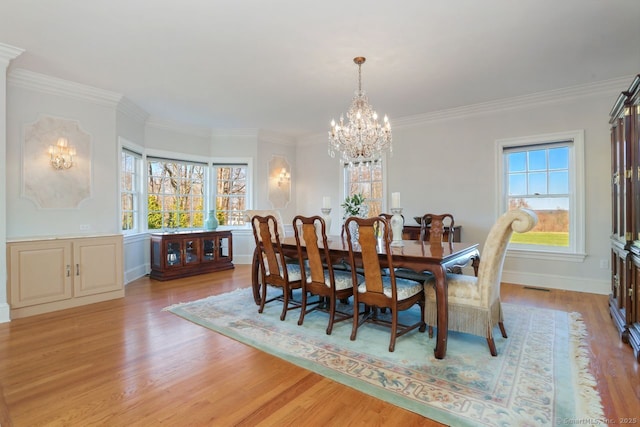 7 Long Meadow Ln, Redding, CT 06896 - dining area with crown molding, a chandelier, a wealth of natural light, and light wood-type flooring