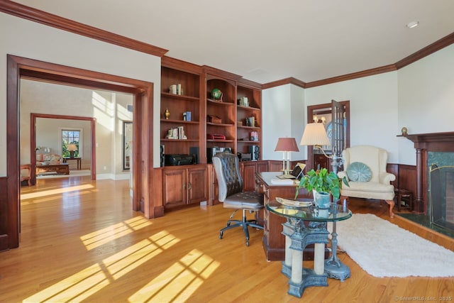 7 Long Meadow Ln, Redding, CT 06896 - home office featuring light wood-style floors, ornamental molding, and a fireplace