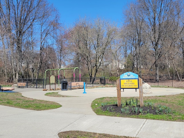 view of community featuring fence
