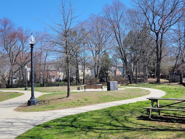 view of home's community featuring a yard