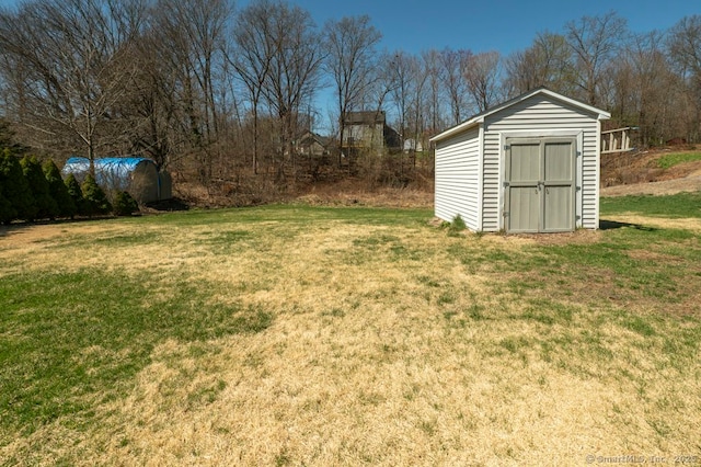 82 Summer St Unit A, Southington, CT 06489 - view of yard with an outbuilding and a storage unit