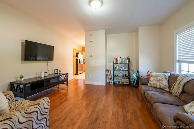 82 Summer St Unit A, Southington, CT 06489 - living area with wood-type flooring and baseboards