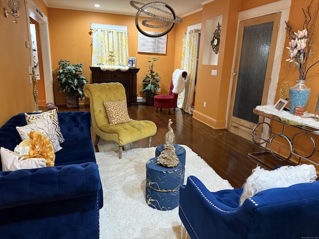 1314 Huntington Rd, Stratford, CT 06614 - living room featuring recessed lighting, baseboards, ornamental molding, and wood finished floors