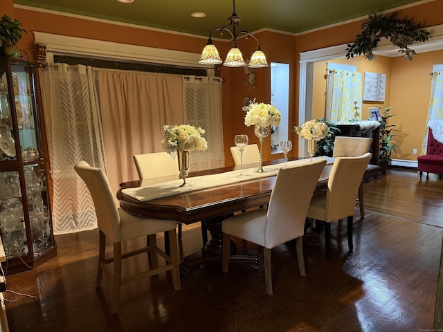 1314 Huntington Rd, Stratford, CT 06614 - dining area featuring crown molding, recessed lighting, a chandelier, wood finished floors, and a baseboard radiator