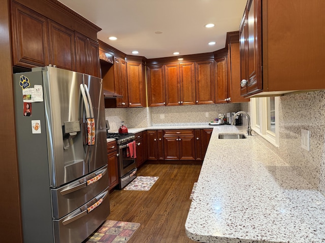 1314 Huntington Rd, Stratford, CT 06614 - kitchen featuring a sink, decorative backsplash, appliances with stainless steel finishes, and dark wood-style floors