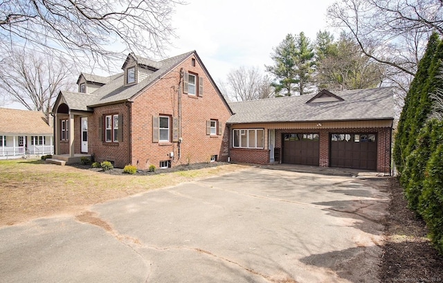 view of property exterior with brick siding, driveway, a shingled roof, and a garage