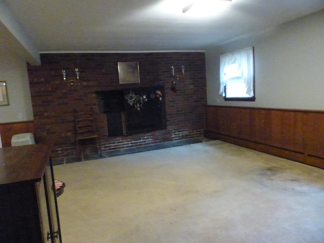 48 Renshaw Rd, Hamden, CT 06518 - unfurnished living room featuring wainscoting, a fireplace, carpet, and wood walls