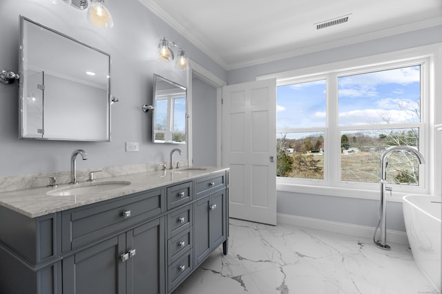 bathroom featuring a soaking tub, double vanity, a sink, and visible vents