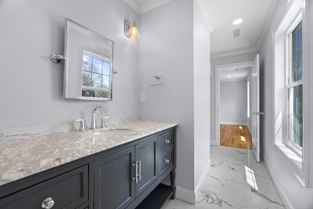 bathroom featuring vanity, ornamental molding, recessed lighting, marble finish floor, and baseboards
