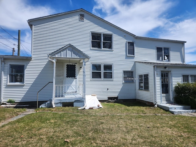 view of front of house with a front lawn