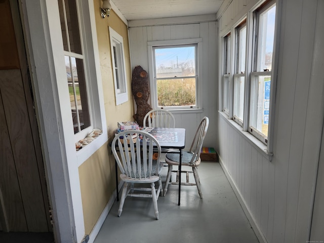 sunroom / solarium with finished concrete floors