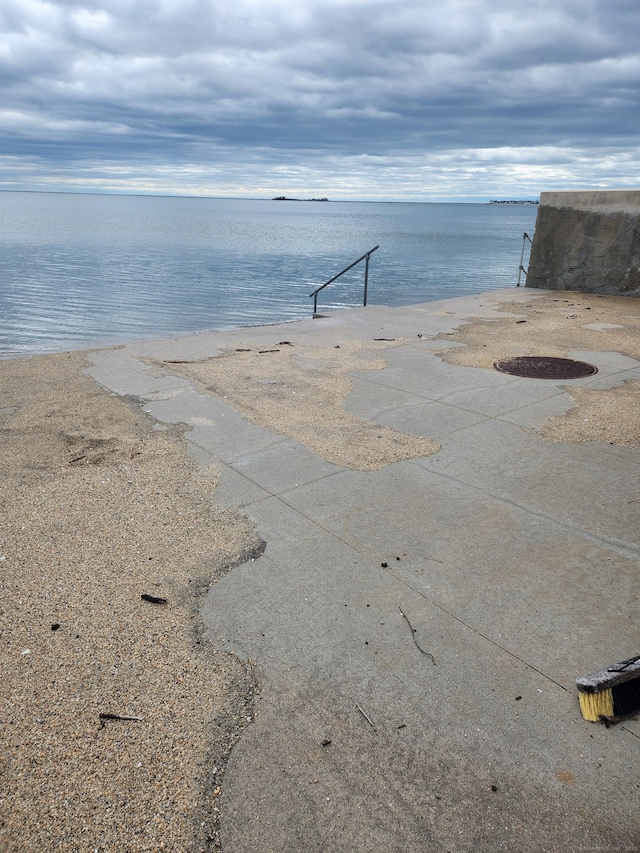 view of water feature with a beach view