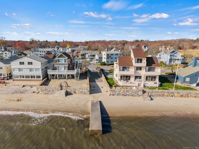 aerial view featuring a water view and a residential view