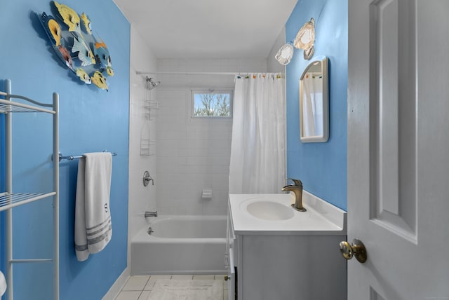 bathroom featuring tile patterned floors, shower / tub combo, and vanity