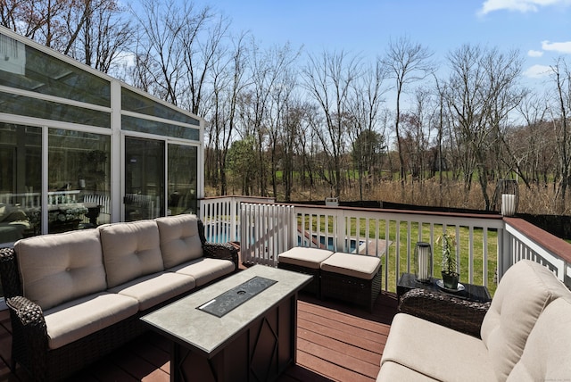 wooden deck featuring an outdoor living space