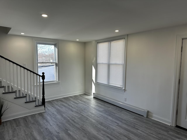 384 Sylvan Ave, Waterbury, CT 06706 - foyer featuring baseboard heating, wood finished floors, recessed lighting, baseboards, and stairs