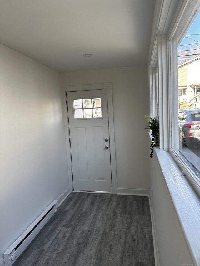 384 Sylvan Ave, Waterbury, CT 06706 - entryway with a baseboard radiator, dark wood-style floors, and baseboards