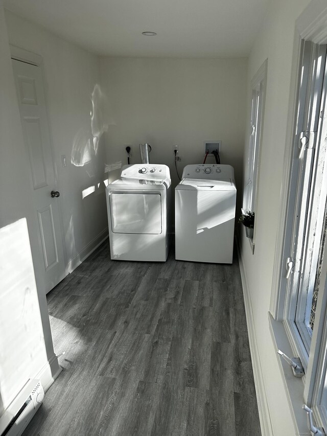 384 Sylvan Ave, Waterbury, CT 06706 - laundry area with washer and dryer, dark wood-type flooring, baseboard heating, and baseboards