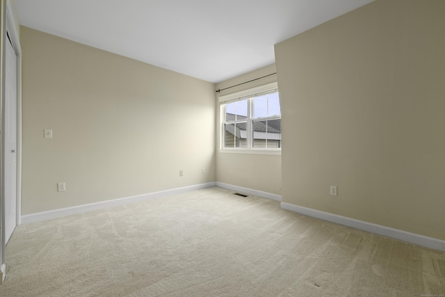 49 Glenbrook Rd Apt 209, Stamford, CT 06902 - unfurnished room featuring light carpet, visible vents, and baseboards