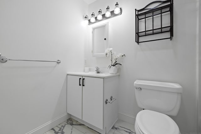 49 Glenbrook Rd Apt 209, Stamford, CT 06902 - bathroom with marble finish floor, vanity, baseboards, and toilet