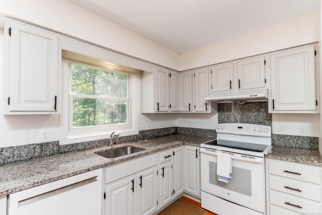 2 Cassella Dr, Wallingford, CT 06492 - kitchen with white appliances, under cabinet range hood, a sink, light stone counters, and white cabinets