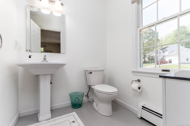 2 Cassella Dr, Wallingford, CT 06492 - bathroom with a baseboard radiator, baseboards, plenty of natural light, and toilet