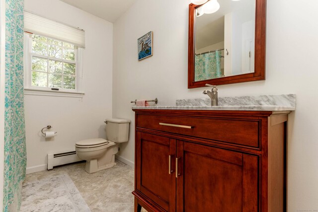 2 Cassella Dr, Wallingford, CT 06492 - full bath featuring baseboard heating, baseboards, toilet, and vanity