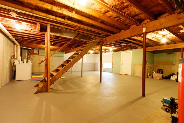 2 Cassella Dr, Wallingford, CT 06492 - unfinished basement featuring washer and clothes dryer and stairway