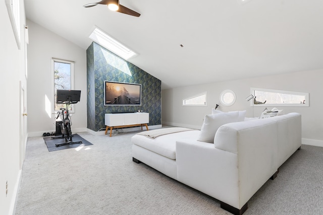 46 Wallace Rd, Branford, CT 06405 - carpeted living area featuring lofted ceiling, baseboards, a ceiling fan, wallpapered walls, and an accent wall