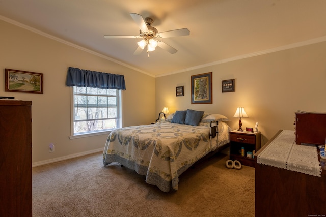 carpeted bedroom featuring crown molding, baseboards, a ceiling fan, and vaulted ceiling