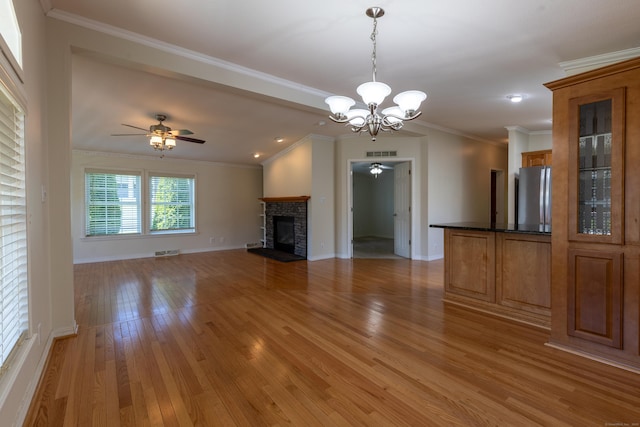 20 Cliff Rd, Ledyard, CT 06339 - unfurnished living room with a chandelier, ceiling fan, light wood-style floors, baseboards, and crown molding