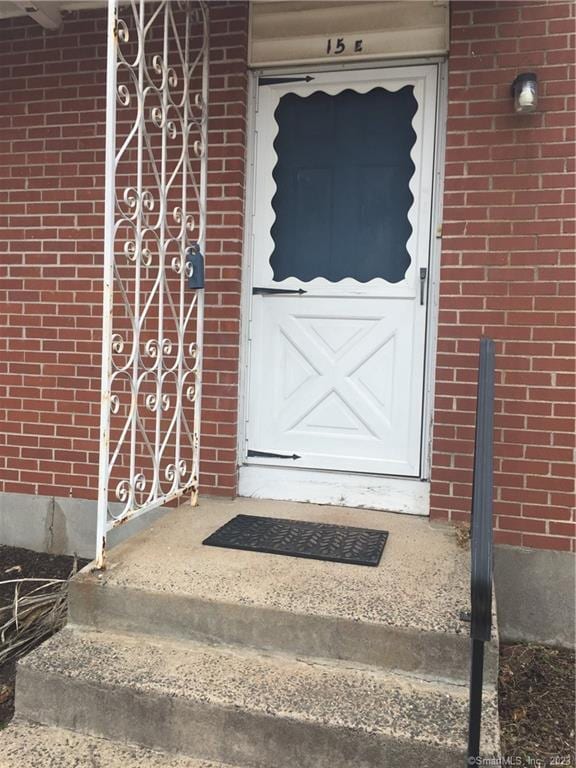273 Queen St Apt 15E, Southington, CT 06489 - property entrance with brick siding
