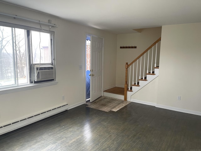 273 Queen St Apt 15E, Southington, CT 06489 - foyer entrance with a baseboard radiator, wood finished floors, a wealth of natural light, and stairs