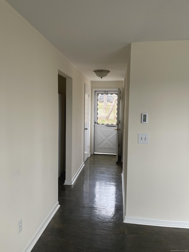 273 Queen St Apt 15E, Southington, CT 06489 - hallway with dark wood finished floors and baseboards