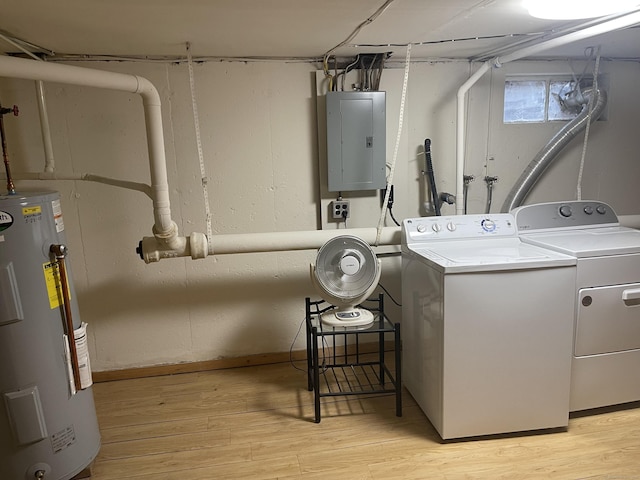 273 Queen St Apt 15E, Southington, CT 06489 - laundry room with water heater, light wood finished floors, laundry area, independent washer and dryer, and electric panel