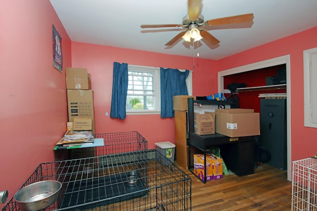 interior space featuring ceiling fan and wood finished floors