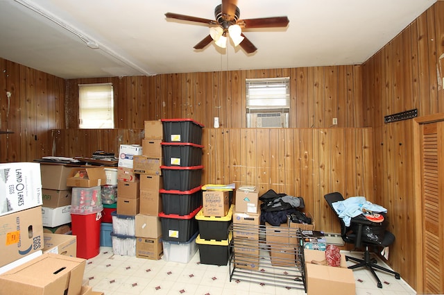 storage room with a ceiling fan and cooling unit
