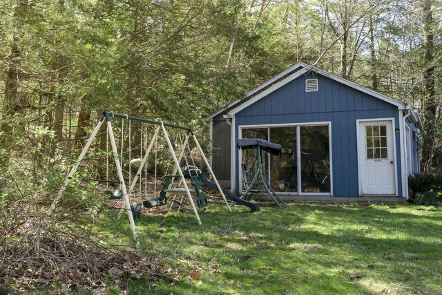 56 Laurel Hill Dr, Woodstock, CT 06282 - view of outdoor structure featuring a playground and a wooded view
