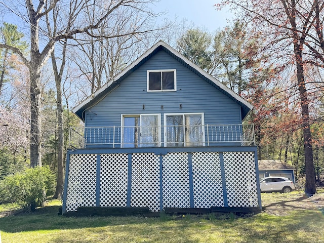 56 Laurel Hill Dr, Woodstock, CT 06282 - back of property featuring a lawn