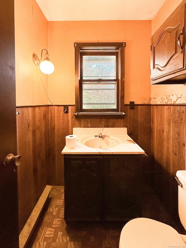 56 Laurel Hill Dr, Woodstock, CT 06282 - half bath featuring wainscoting, vanity, and wood walls