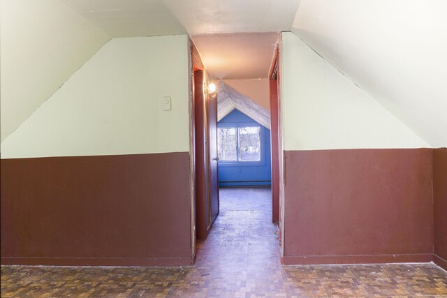 56 Laurel Hill Dr, Woodstock, CT 06282 - bonus room featuring vaulted ceiling and a wainscoted wall