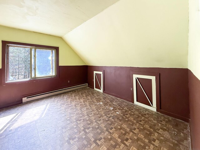 56 Laurel Hill Dr, Woodstock, CT 06282 - additional living space with baseboard heating and vaulted ceiling