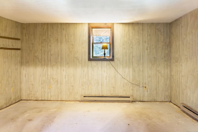 56 Laurel Hill Dr, Woodstock, CT 06282 - below grade area featuring a baseboard heating unit, a baseboard radiator, and wood walls