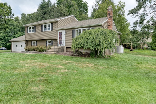 18 Black Birch Rd, Plainville, CT 06062 - tri-level home with a chimney, a front lawn, an attached garage, view of scattered trees, and a shingled roof