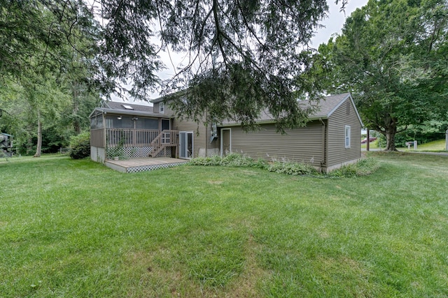 18 Black Birch Rd, Plainville, CT 06062 - rear view of house with a sunroom, a yard, a deck, and a shingled roof